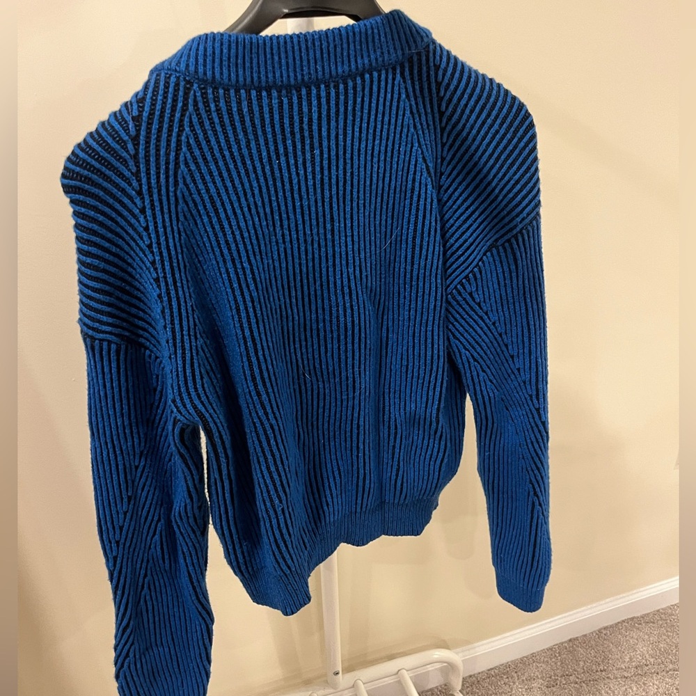 Short royal blue and black sweater size Medium 7-9